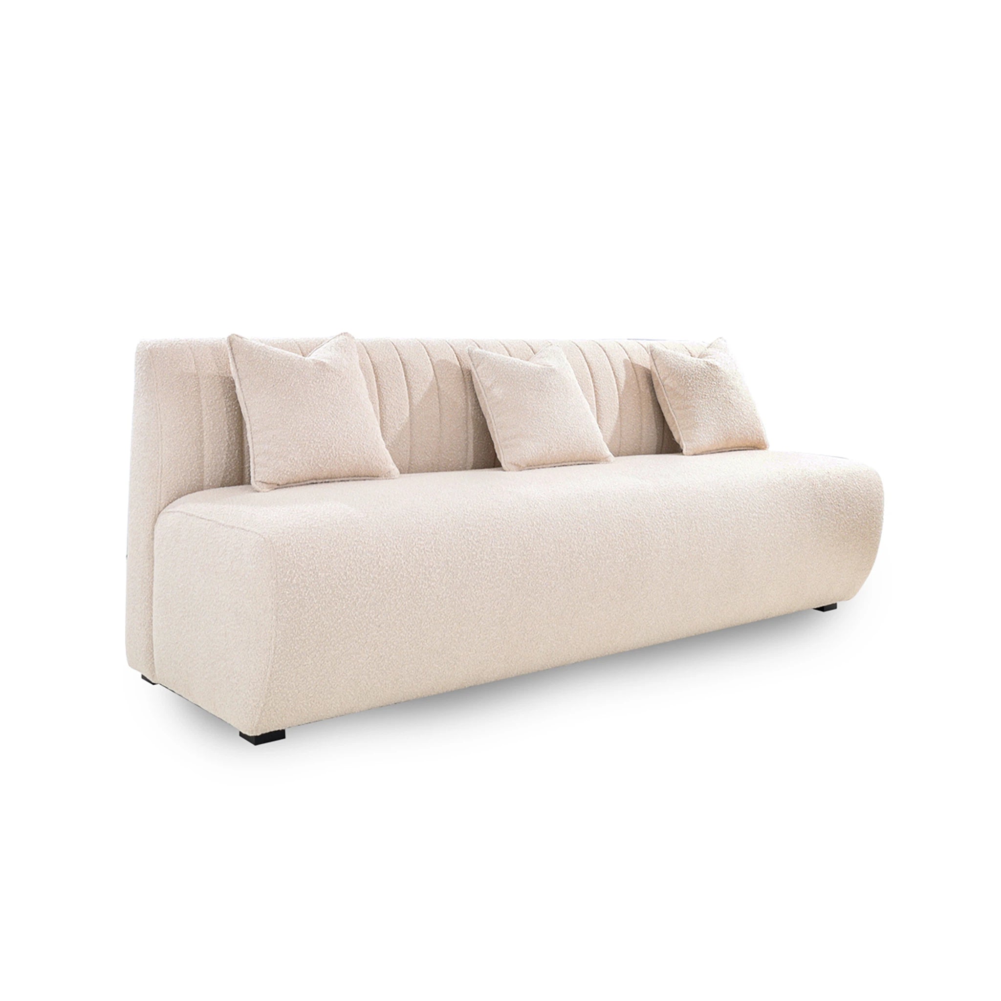 Beige sofa with three cushions on a white background