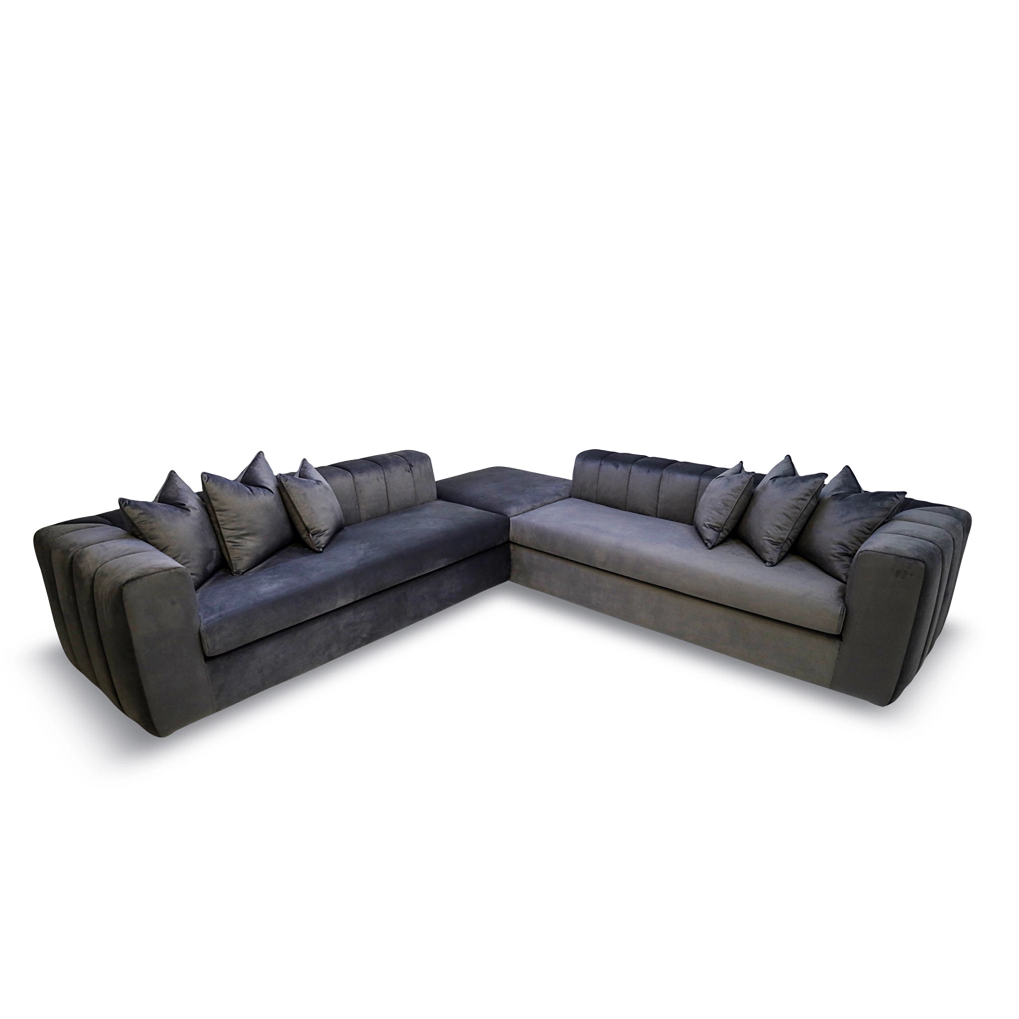 Gray sectional sofa with multiple cushions on a white background