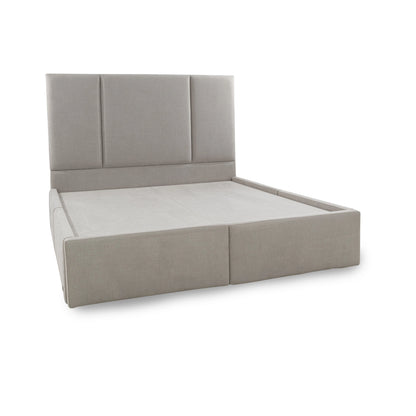 Gray upholstered bed frame on a white background