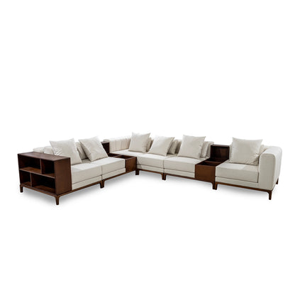 Sectional sofa with wooden frames and white cushions on a white background