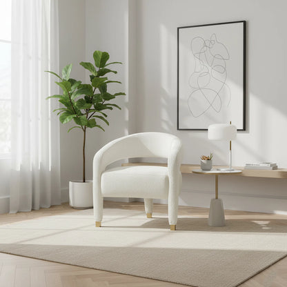 Modern living room with a white armchair, plant, and abstract art on the wall.