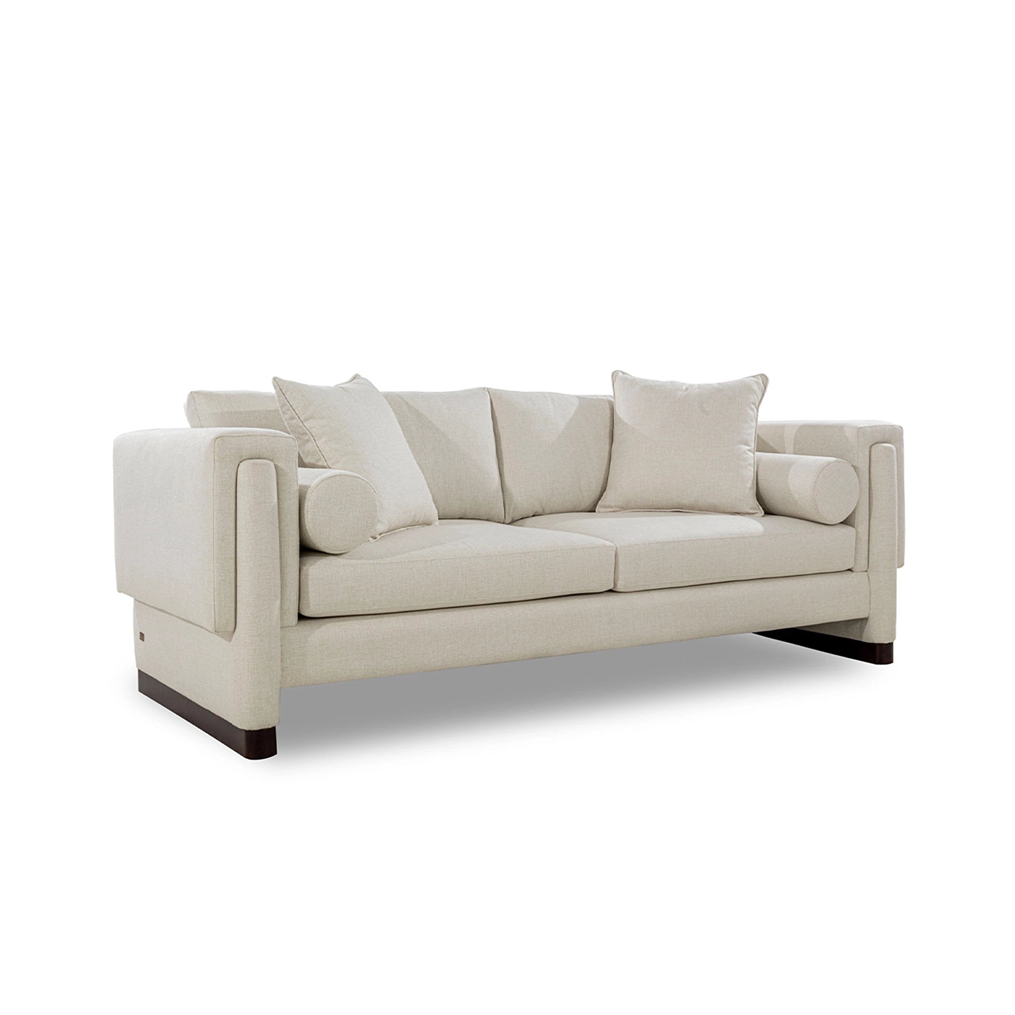 Beige sofa with cushions on a white background