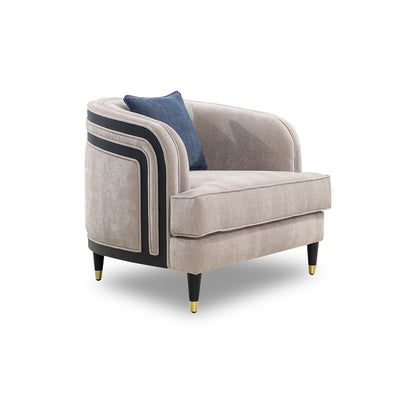 Gray armchair with black accents and a blue pillow on a white background