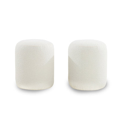 Two cylindrical white objects on a white background