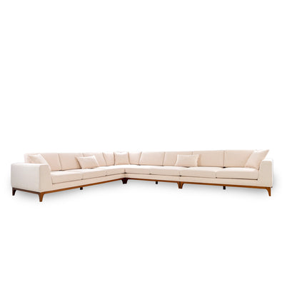 Beige sectional sofa on a white background