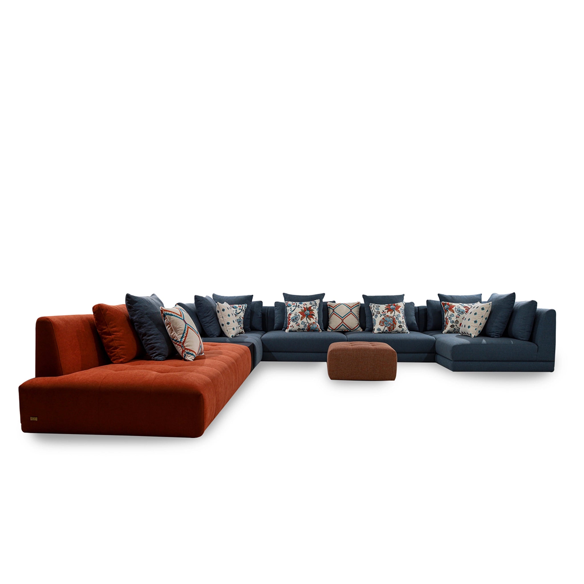 Sectional sofa with orange and blue cushions on a white background