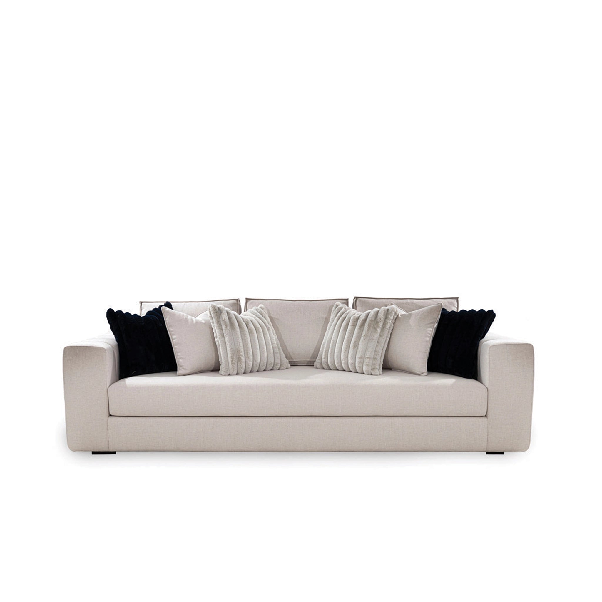Beige sofa with decorative pillows on a white background
