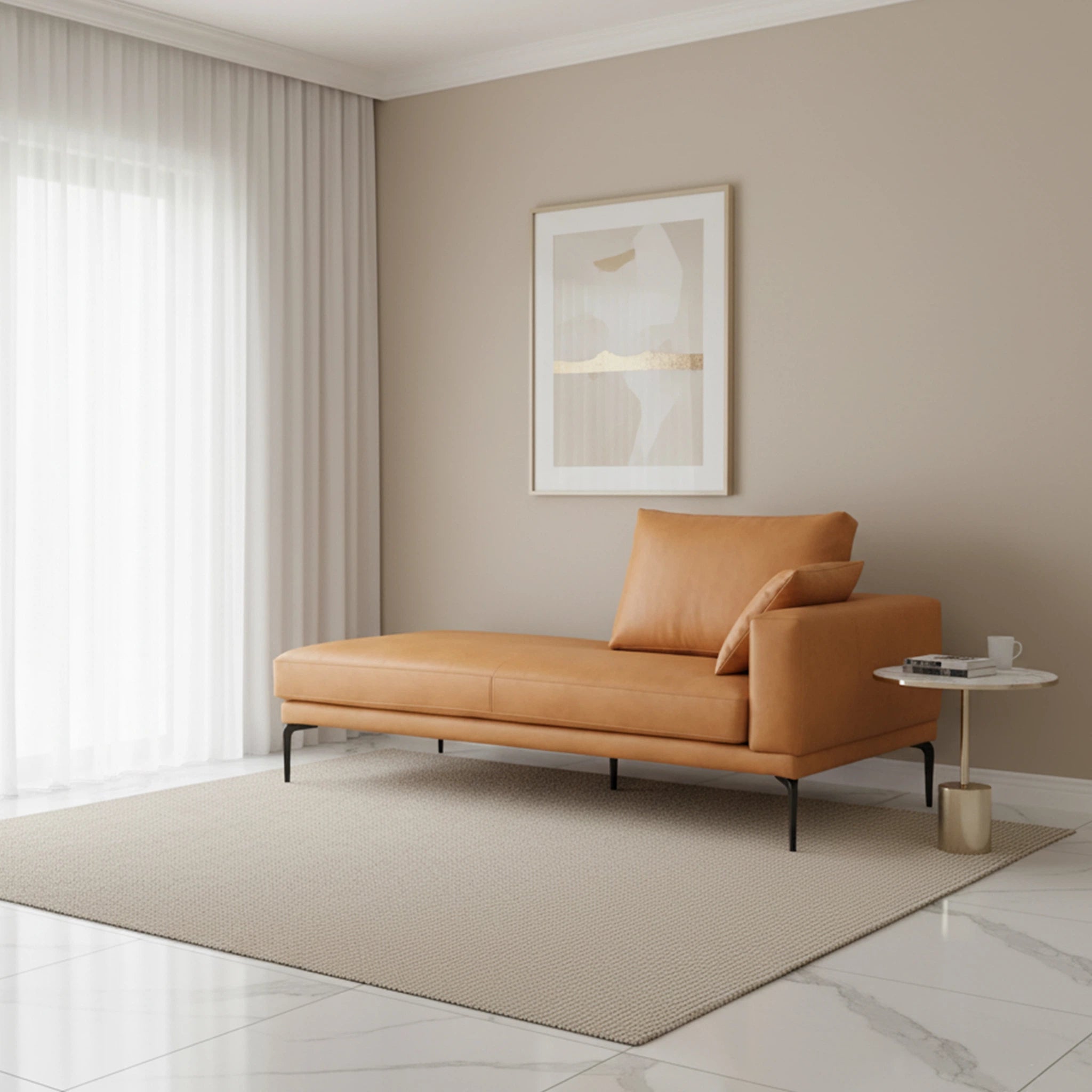 Modern living room with a tan leather chaise lounge, side table, and framed artwork.
