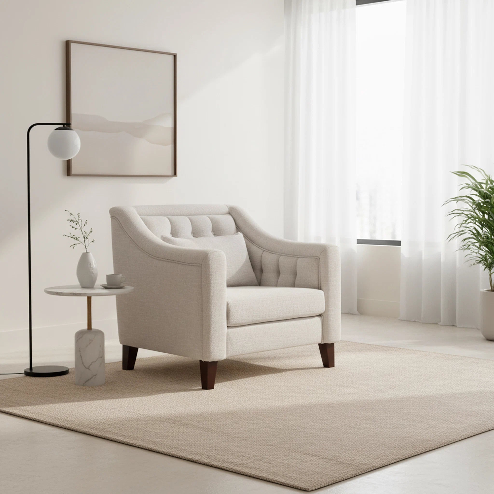 Beige armchair in a modern living room with a lamp and small table.