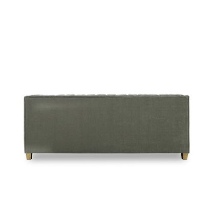 Green upholstered bench on a white background