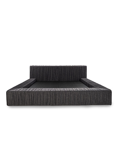 Black woven outdoor sofa on a white background