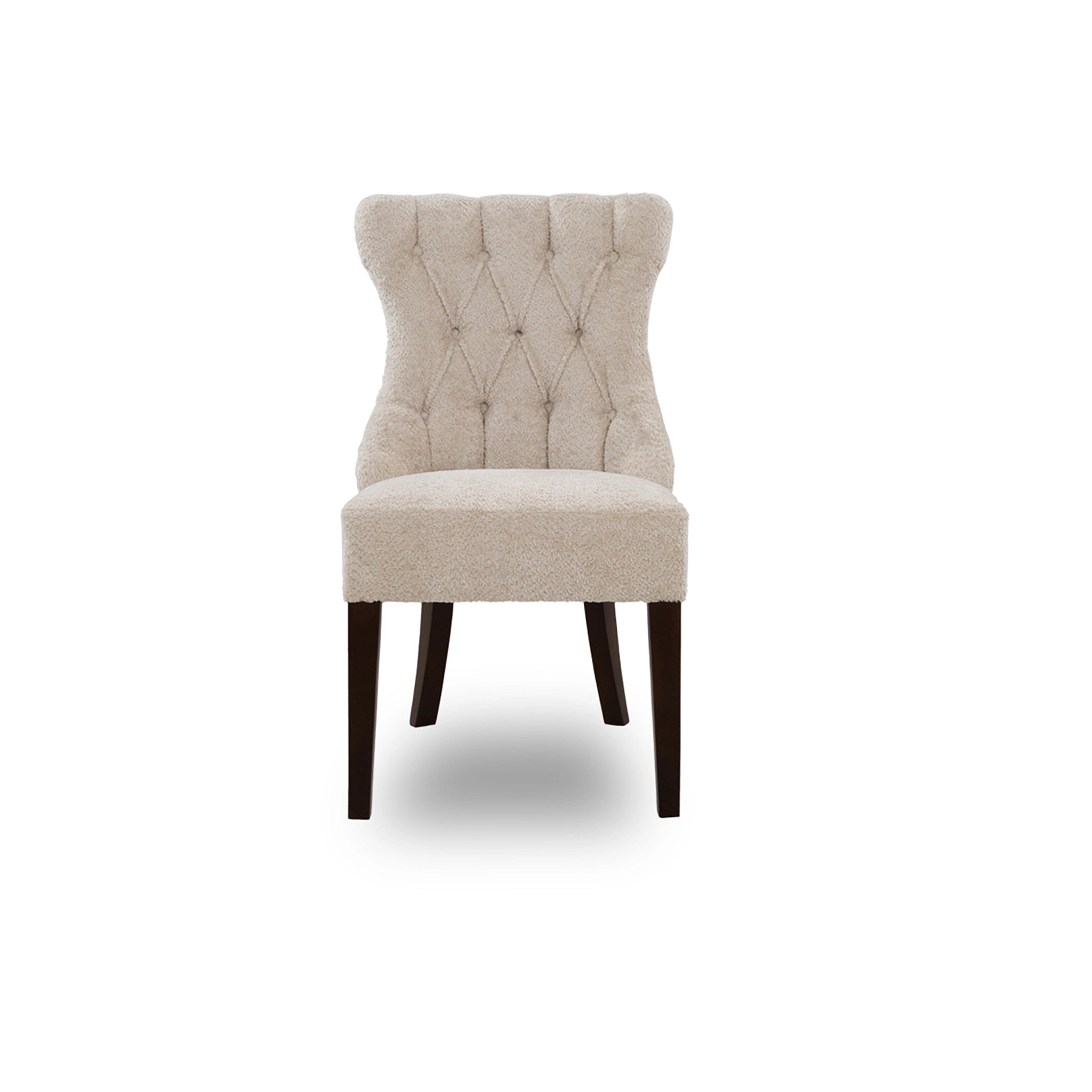 Beige upholstered chair with tufted backrest on a white background