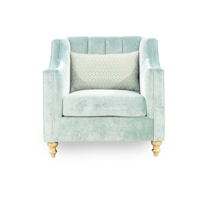 Light blue armchair with a matching pillow on a white background