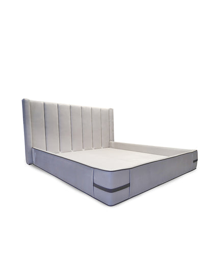 Gray mattress with a headboard on a white background