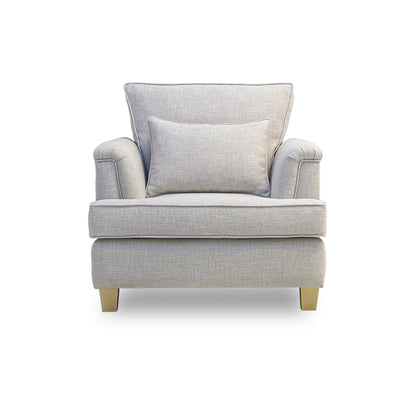 Gray armchair with a cushion on a white background