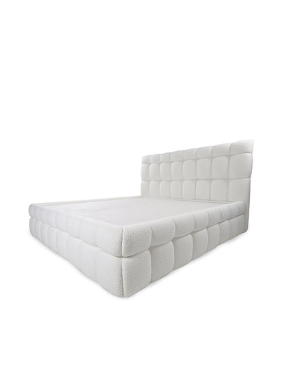 White quilted mattress on a white background
