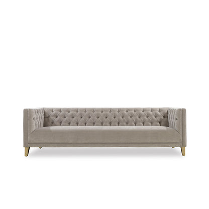 Gray tufted sofa on a white background