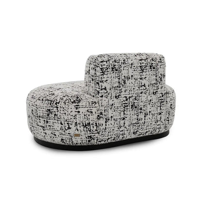 Textured armchair with black and white pattern on a white background