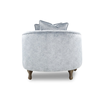 Gray armchair with wooden legs on a white background