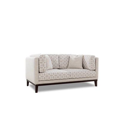 Beige patterned sofa on a white background
