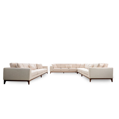 Beige sectional sofa on a white background
