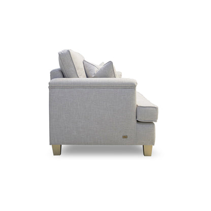 Gray sofa with beige cushions on a white background