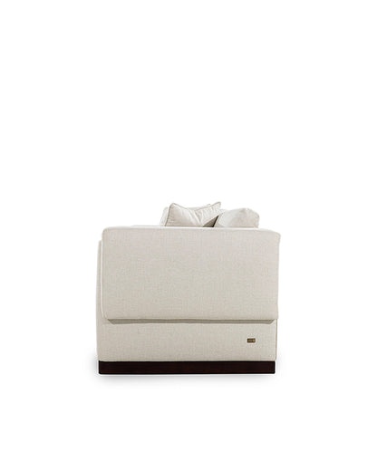 White armchair with a dark base on a white background