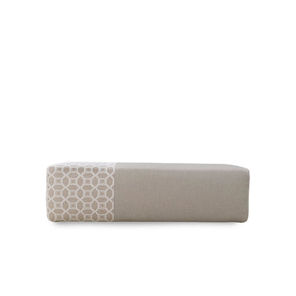 Rectangular cushion with geometric pattern on a white background