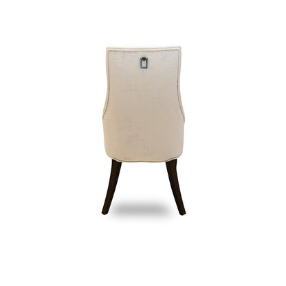 Beige chair with dark wooden legs on a white background