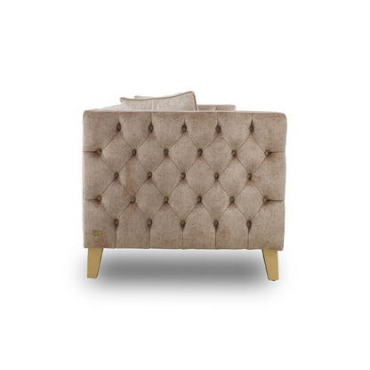 Beige armchair with tufted backrest on a white background