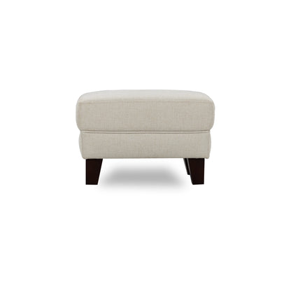 Beige ottoman with dark wood legs on a white background