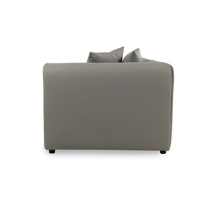 Gray sofa with two cushions on a white background