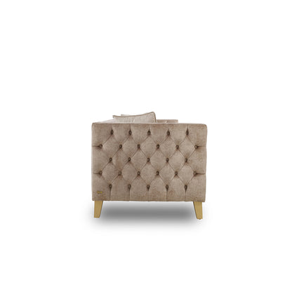 Beige armchair with tufted backrest on a white background