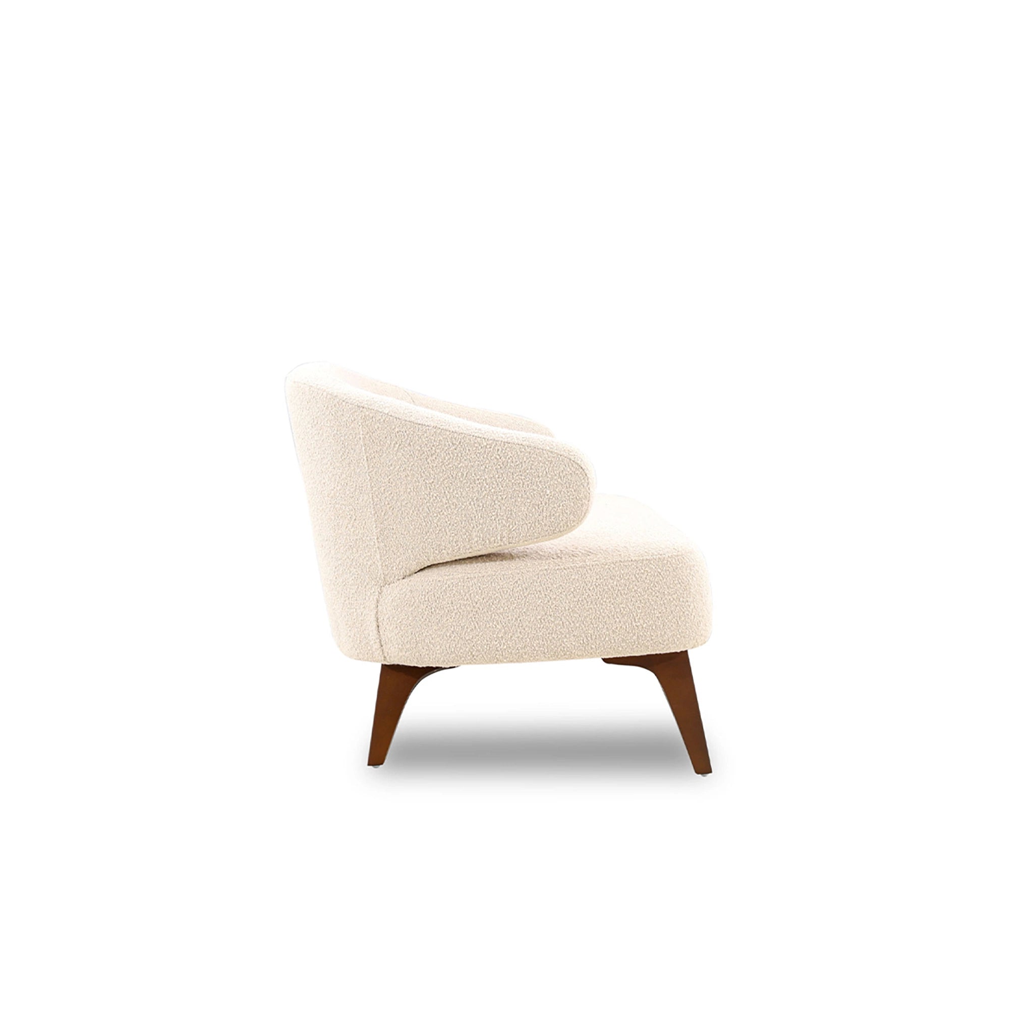 Beige armchair with wooden legs on a white background
