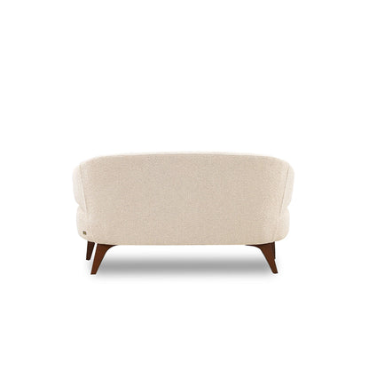 Beige armchair with wooden legs on a white background
