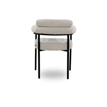 Stool with a textured top and black legs on a white background