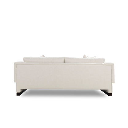 Beige sofa on a white background
