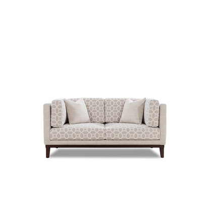 Beige patterned sofa on a white background