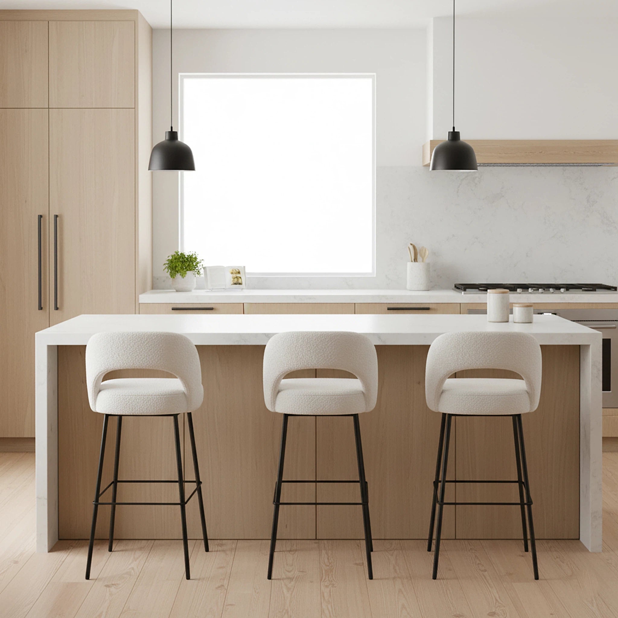 Modern kitchen with a white island and three bar stools.