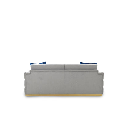 Gray sofa with blue cushions on a white background