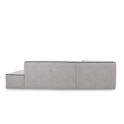Gray upholstered bench on a white background