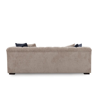 Beige sofa with dark cushions on a white background