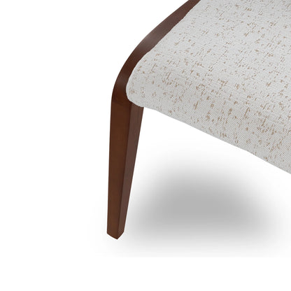 Close-up of a chair with wooden leg and textured fabric seat on a white background