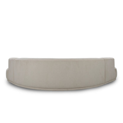 Round beige ottoman on a white background