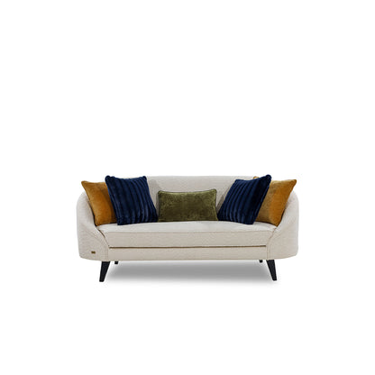 Beige sofa with colorful cushions on a white background