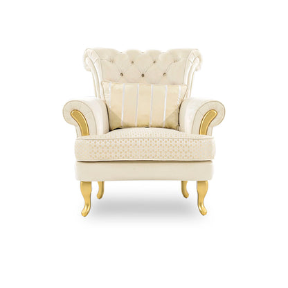 Cream-colored armchair with gold accents on a white background