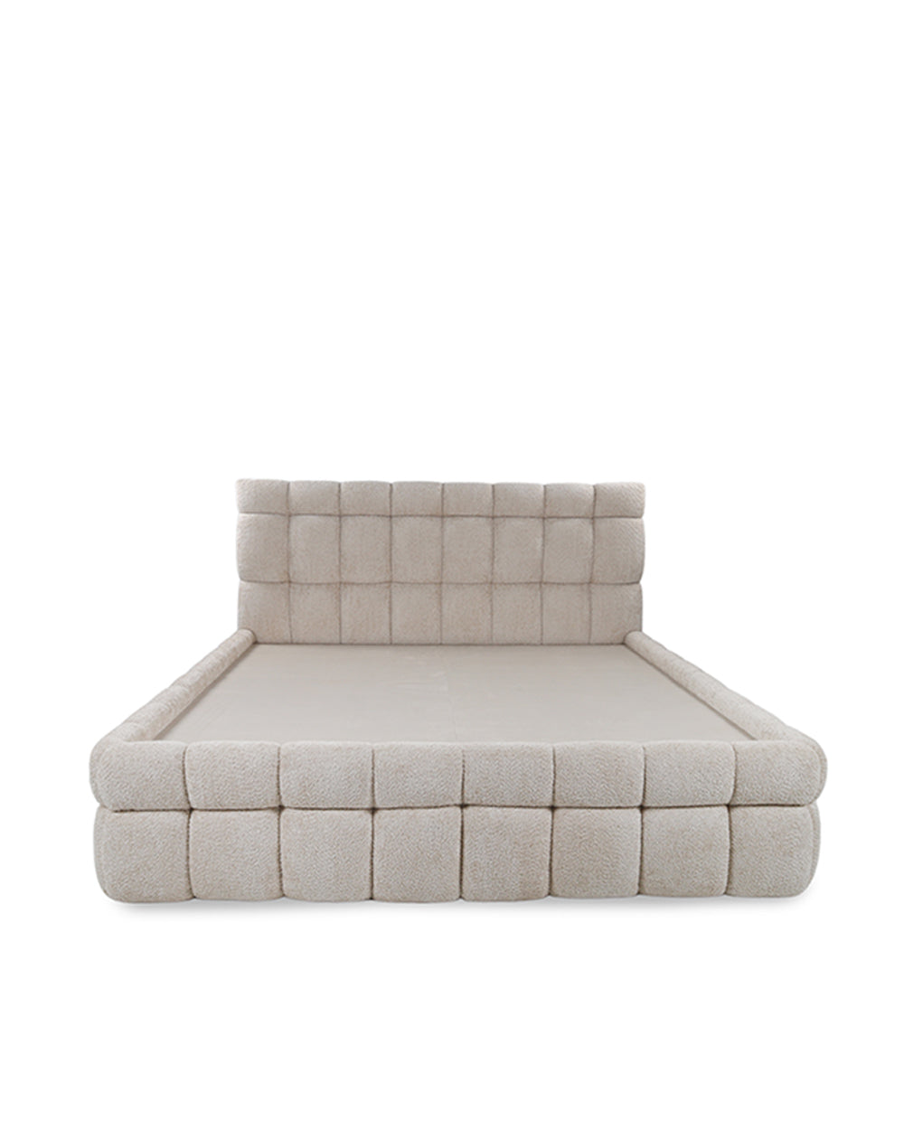 Beige tufted sofa on a white background