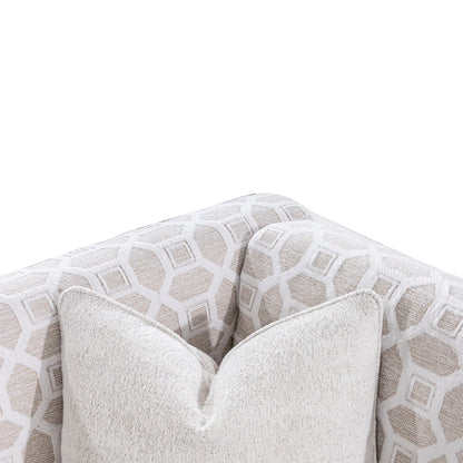 Close-up of a patterned sofa with a pillow on a white background
