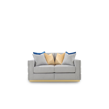 Gray sofa with colorful cushions on a white background
