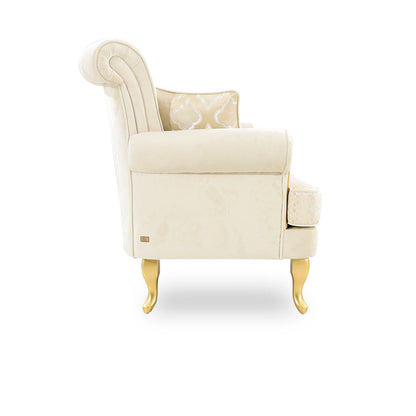 Cream-colored armchair with a decorative pillow on a white background